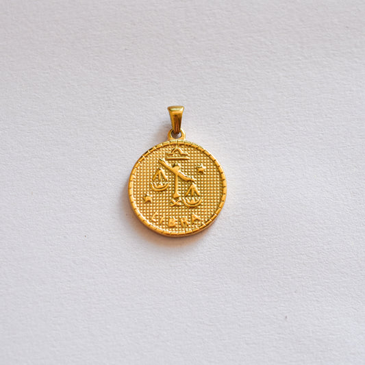 libra medalla